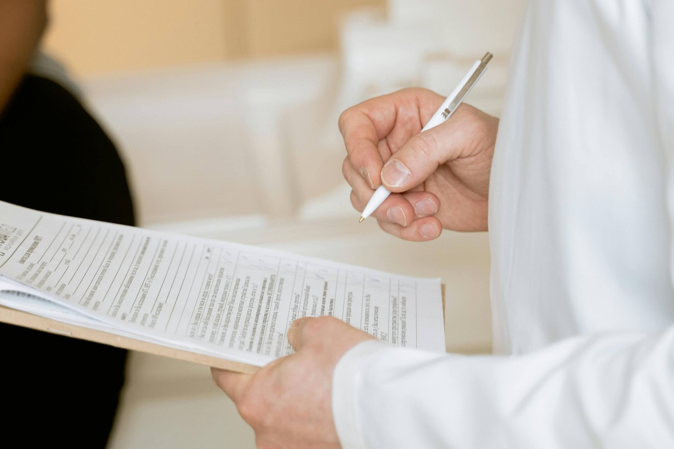 Doctor office, signing a document